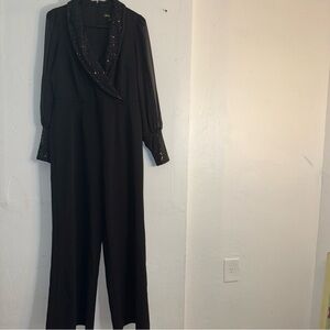 Black Wrap-Style Jumpsuit with V-Neckline and Long Sleeves pre-owned